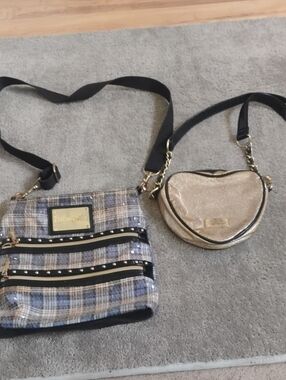 Get 2 Betsey Johnson Purses For 10.00 Total.  Good Condition